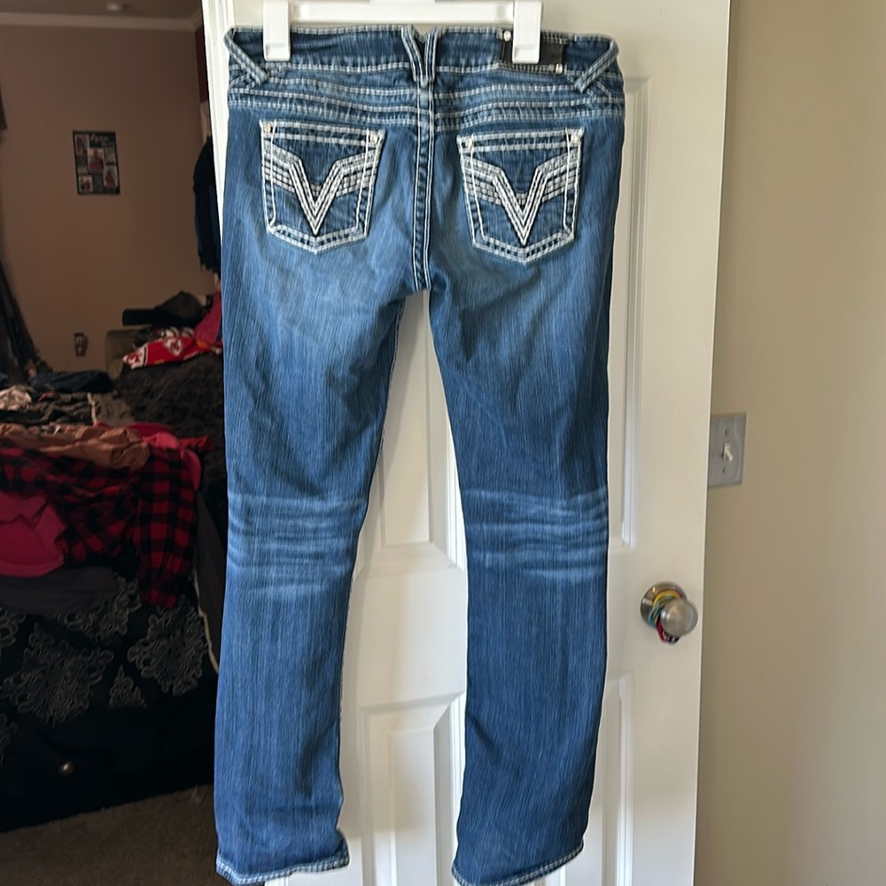 vigoss in good condition size 12